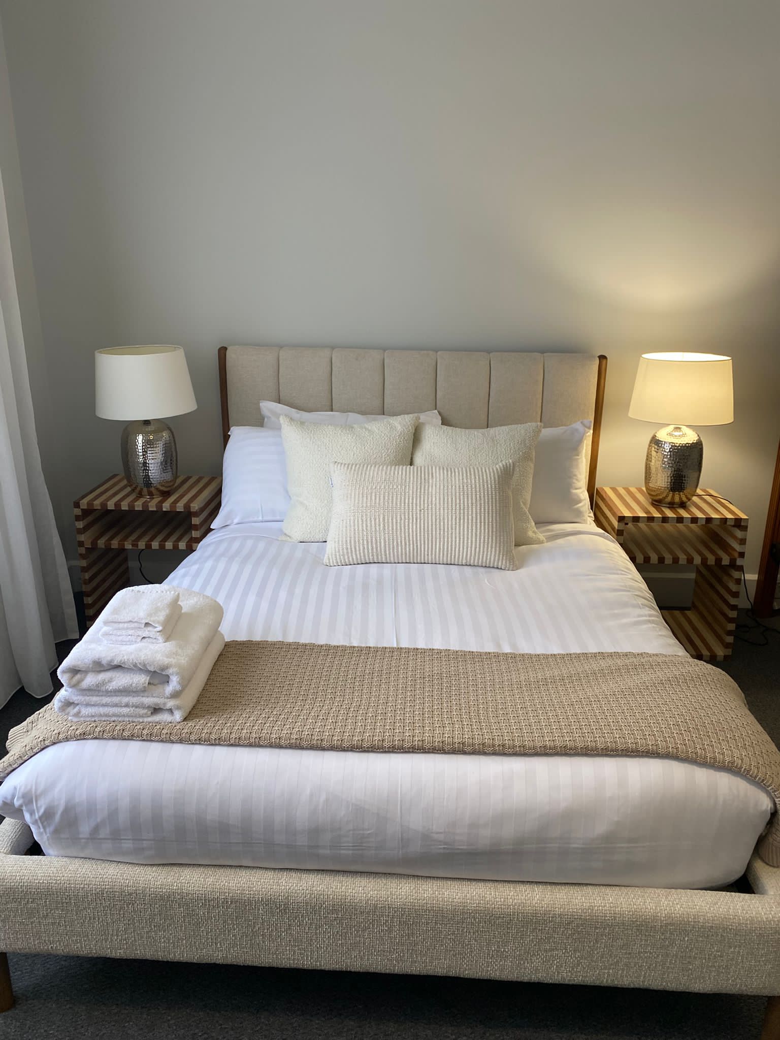 Launceston Airbnb cleaner making beds professionally