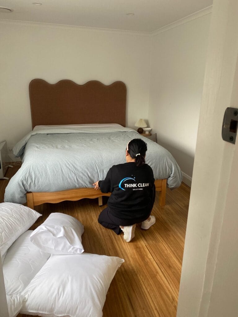 Expert airbnb cleaner from Think Clean Solutions preparing luxury Hobart Airbnb for guests